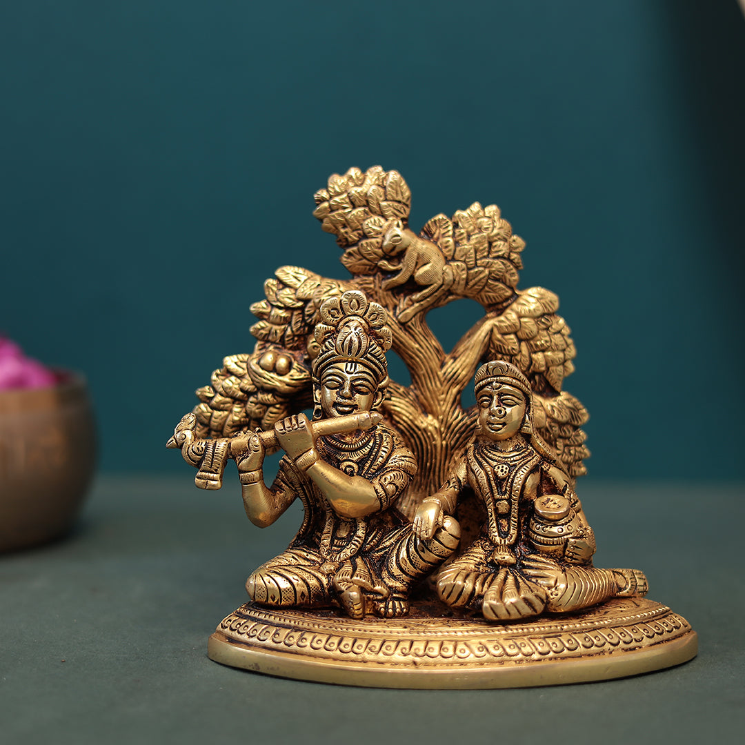 Divine love and devotion shared between Lord Krishna and Radha Idol In Brass