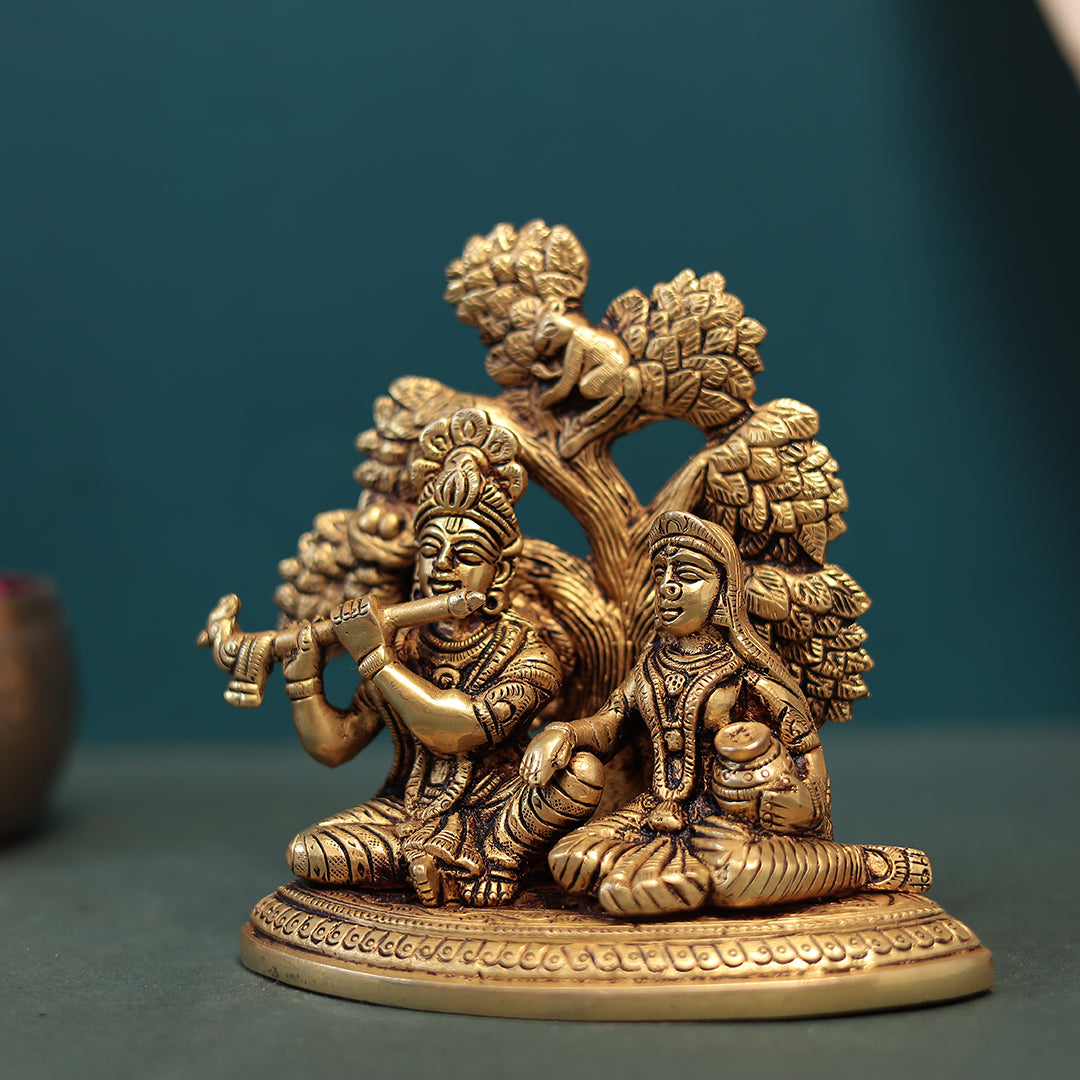 Divine love and devotion shared between Lord Krishna and Radha Idol In Brass