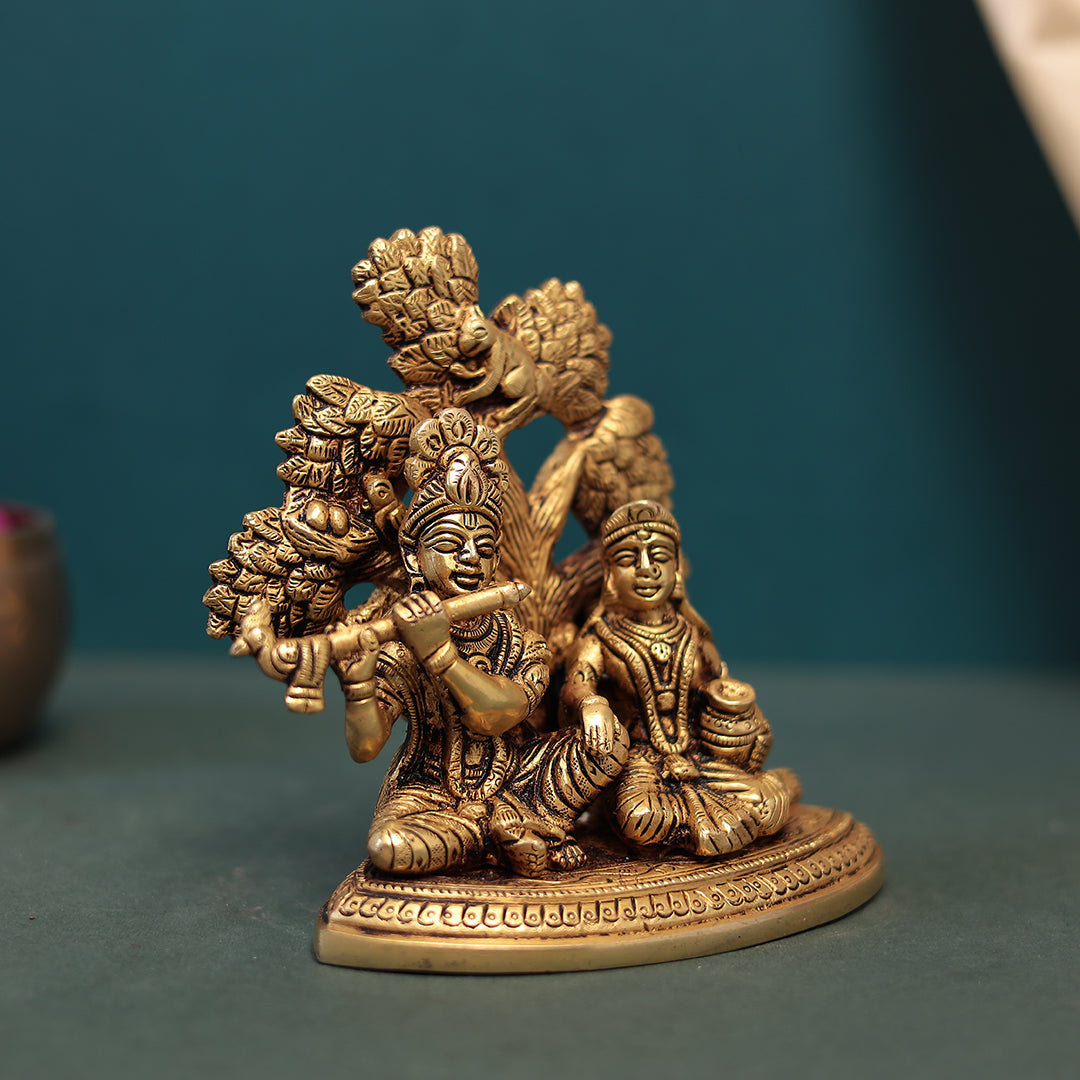 Divine love and devotion shared between Lord Krishna and Radha Idol In Brass